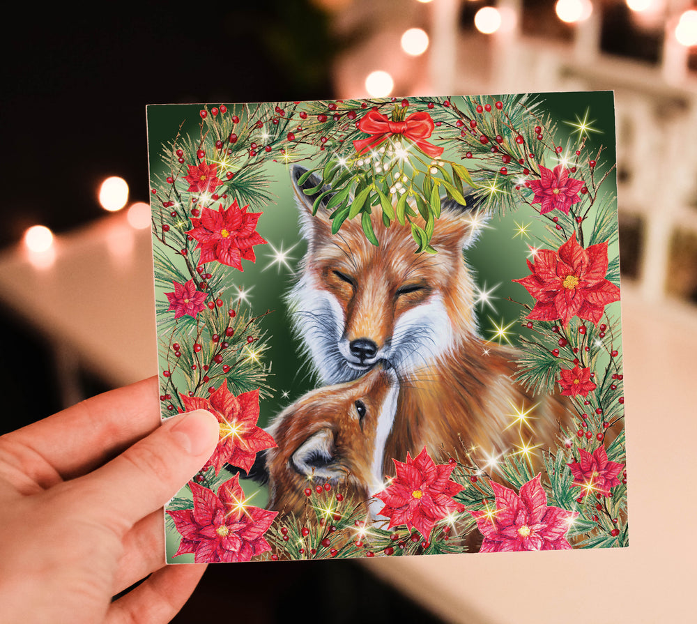 christmas card with foxes